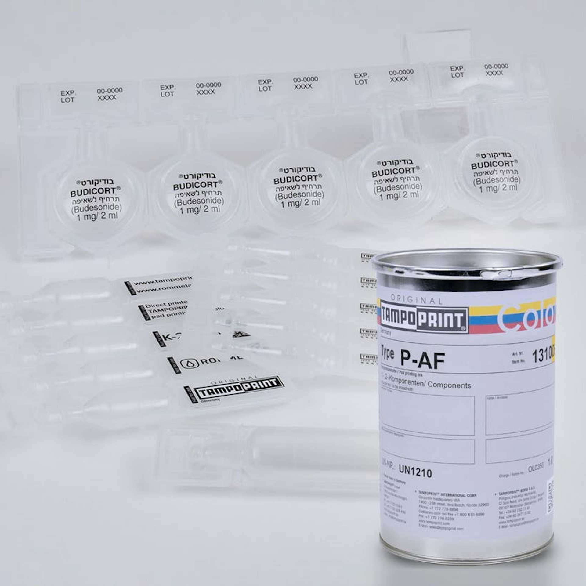 Eine Type P-AF Tampondruckfarbdose mit medizinischen Produkten im Hintergrund.